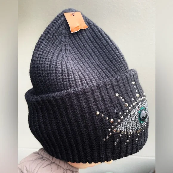 Black Beanie with Eye Design by Kurt Geiger.
NWOT - Picture 7 of 17